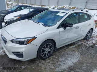2018 Subaru Impreza Limited with VIN 4S3GTAT60J3718191, listed as a IAAI auction lot 41612498 with 34,311 mi miles. Bid and sale history available at carsss.com. Image 17.