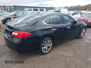 2013 Infiniti M37 with VIN JN1BY1AP9DM513719, listed as a IAAI auction lot 41543165 with 141,488 mi miles. Bid and sale history available at carsss.com. Image 4.