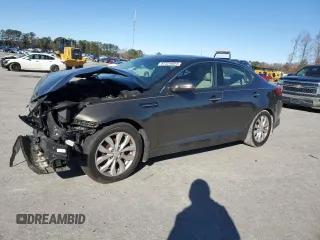 2014 Kia Optima EX z VIN 5XXGN4A72EG284577, wystawiony jako Copart lot #87324684 z przebiegiem 148 442 mil mil oraz Szkody całkowita. Historia ofert i sprzedaży dostępna na DreamBid. Obrazek 1.