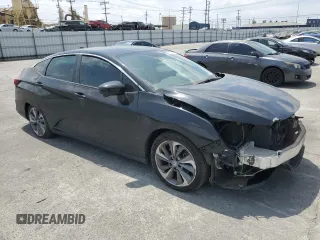 2018 Honda Clarity Plug-In Hybrid with VIN JHMZC5F11JC011244, listed as a Copart auction lot 54581165 with 130,698 mi miles and Salvage Title. Bid and sale history available at carsss.com. Image 4.