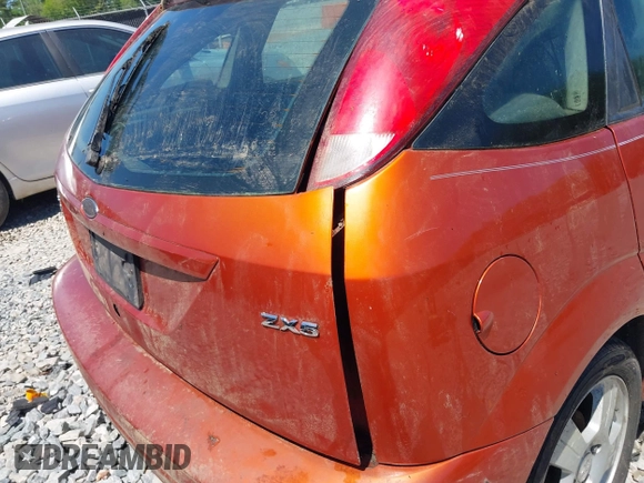 2005 Ford Focus S with VIN 3FAFP37N85R113281, listed as a IAAI auction lot 42037187 with Not Provided miles and . Bid and sale history available at carsss.com. Image 6.