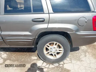 1999 Jeep Grand Cherokee Limited with VIN 1J4GW68N5XC773100, listed as a IAAI auction lot 41998432 with Not provided miles and . Bid and sale history available at DreamBid. Image 16.