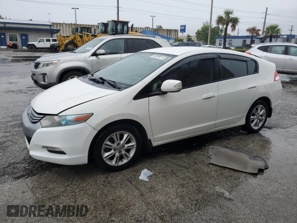 2011 Honda Insight EX z VIN JHMZE2H79BS009016, wystawiony jako Copart lot #59098615 z przebiegiem 136 715 mil mil oraz Szkoda całkowita • Salvage title. Historia ofert i sprzedaży dostępna na DreamBid. Obrazek 1.