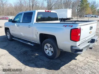 2015 Chevrolet Silverado 1500 LT with VIN 3GCUKREC4FG445820, listed as a IAAI auction lot 41844159 with 141,530 mi miles. Bid and sale history available at carsss.com. Image 3.