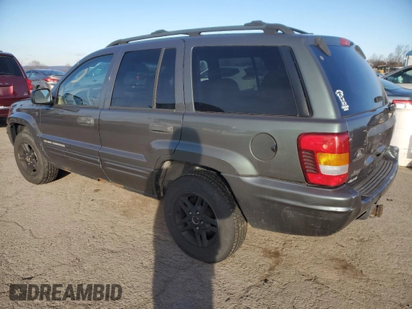 2004 Jeep Grand Cherokee with VIN 1J8GW48N24C304268, listed as a Copart auction lot 45559065 with 252,903 mi miles and Salvage title. Bid and sale history available at DreamBid. Image 2.