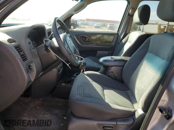 2003 Ford Escape XLT Popular 2 with VIN 1FMYU93123KD17718, listed as a Copart auction lot 74043074 with 347,585 mi miles and Clean Title. Bid and sale history available at carsss.com. Image 7.