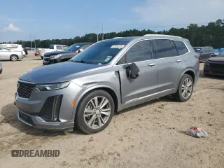 2020 Cadillac XT6 FWD Premium Luxury с VIN 1GYKPCRS1LZ132172, выставлен на аукционе Copart как лот 62580135 с пробегом 115 804 миль миль и Списание • Salvage title. История ставок и продаж доступна на DreamBid. Изображение 1.