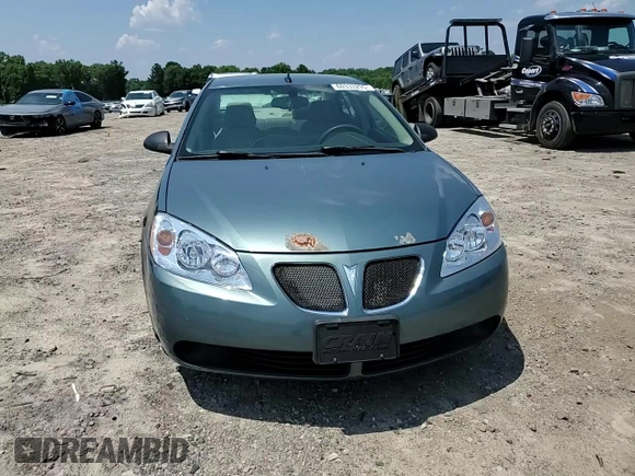 2009 Pontiac G6 1SA with VIN 1G2ZG57B294112753, listed as a Copart auction lot 60333295 with 172,422 mi miles and Salvage title. Bid and sale history available at DreamBid. Image 13.