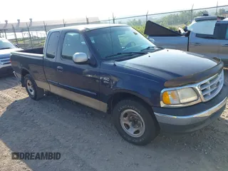 1999 Ford F-150 XL z VIN 1FTRX17L3XNB16928, wystawiony jako IAAI lot #42739602 z przebiegiem 118 577 mil mil oraz . Historia ofert i sprzedaży dostępna na DreamBid. Obrazek 1.