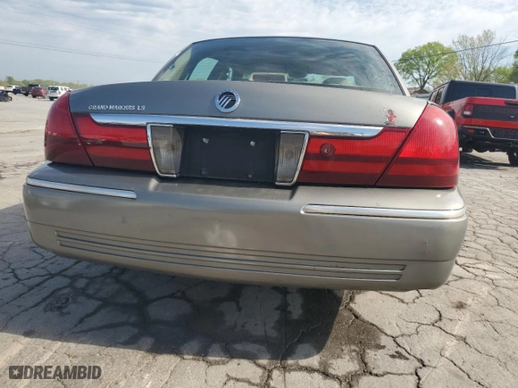 2004 Mercury Grand Marquis LS Premium with VIN 2MEHM75W14X602571, listed as a Copart auction lot 53427295 with 67,423 mi miles and Salvage Title. Bid and sale history available at carsss.com. Image 6.