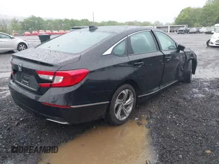 2018 Honda Accord EX with VIN 1HGCV1F4XJA199943, listed as a IAAI auction lot 42263663 with 96,698 mi miles and . Bid and sale history available at DreamBid. Image 4.