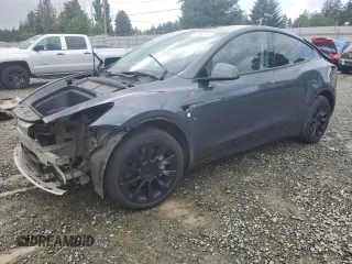 2023 Tesla Model Y Long Range z VIN 7SAYGDEE7PA080807, wystawiony jako Copart lot #56982345 z przebiegiem 20 478 mil mil oraz Szkoda całkowita • Salvage title. Historia ofert i sprzedaży dostępna na DreamBid. Obrazek 1.