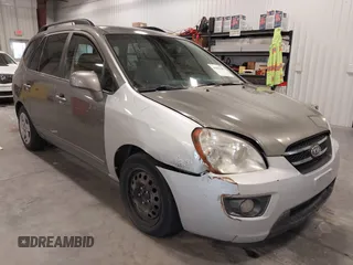 2009 Kia Rondo LX with VIN KNAFG528797237107, listed as a IAAI auction lot 41001189 with 183,282 mi miles. Bid and sale history available at carsss.com. Image 1.