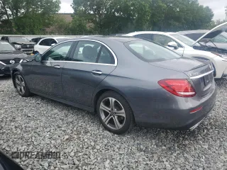 2019 Mercedes-Benz E 300 with VIN WDDZF4KB7KA553856, listed as a Copart auction lot 61025735 with 59,001 mi miles and Salvage title. Bid and sale history available at DreamBid. Image 2.