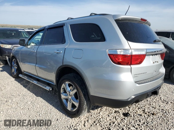 2013 Dodge Durango Citadel with VIN 1C4SDJET2DC602487, listed as a Copart auction lot 62308385 with 124,034 mi miles and Salvage title. Bid and sale history available at DreamBid. Image 2.