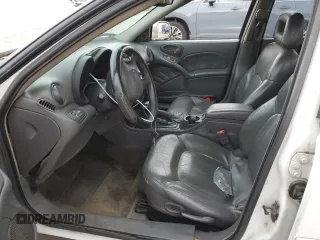 2000 Pontiac Grand Am GT with VIN 1G2NW52E2YM799735, listed as a Copart auction lot 51782455 with 181,850 mi miles and Salvage title. Bid and sale history available at DreamBid. Image 7.