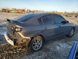 2007 Mazda 3 i Touring with VIN JM1BK32F571676258, listed as a Copart auction lot 87883545 with 141,203 mi miles and Salvage Title. Bid and sale history available at DreamBid. Image 3.