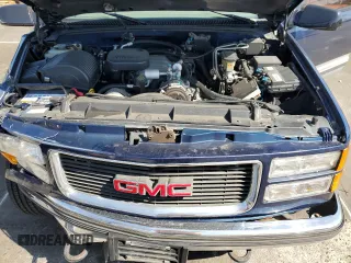 1997 GMC Suburban with VIN 1GKGK26J7VJ748464, listed as a Copart auction lot 52597135 with 176,109 mi miles and Salvage Title. Bid and sale history available at carsss.com. Image 12.