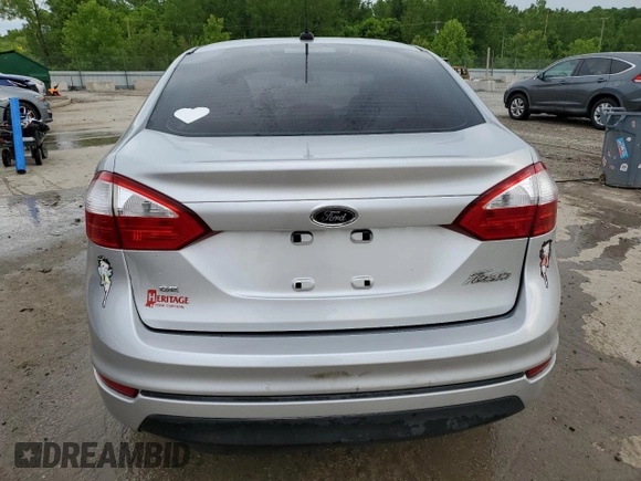 2016 Ford Fiesta SE z VIN 3FADP4BJXGM149197, wystawiony jako Copart lot #57100405 z przebiegiem 106 429 mil mil oraz Nie do naprawy • Non repairable. Historia ofert i sprzedaży dostępna na DreamBid. Obrazek 6.