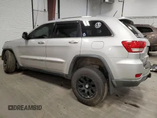 2011 Jeep Grand Cherokee Laredo z VIN 1J4RR4GGXBC609891, wystawiony jako Copart lot #52089645 z przebiegiem 180 895 mil mil oraz Szkoda całkowita • Salvage title. Historia ofert i sprzedaży dostępna na DreamBid. Obrazek 2.