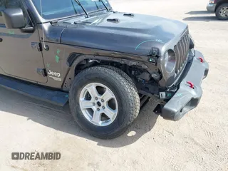 2019 Jeep Wrangler Unlimited Sport S with VIN 1C4HJXDG0KW541940, listed as a IAAI auction lot 42100255 with 68,309 mi miles and . Bid and sale history available at DreamBid. Image 6.