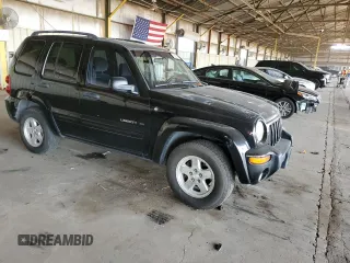 2003 Jeep Liberty Limited with VIN 1J4GL58K13W657703, listed as a Copart auction lot 62957105 with 168,201 mi miles and Salvage title. Bid and sale history available at DreamBid. Image 4.