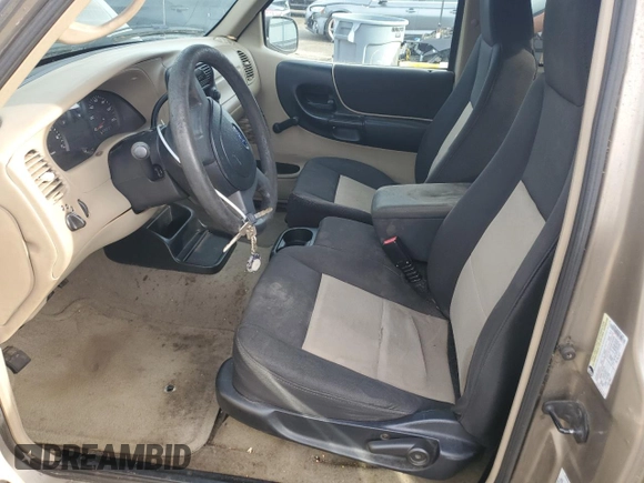 2005 Ford Ranger XL z VIN 1FTYR14U45PA11478, wystawiony jako Copart lot #58513715 z przebiegiem 174 545 mil mil oraz Czysty tytuł • Clean title. Historia ofert i sprzedaży dostępna na DreamBid. Obrazek 7.