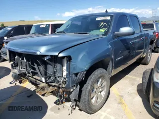 2012 GMC Sierra 1500 SLT with VIN 3GTP2WE7XCG152790, listed as a Copart auction lot 62194455 with 144,317 mi miles and Salvage title. Bid and sale history available at DreamBid. Image 1.