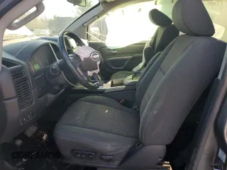 2015 Nissan Titan SV with VIN 1N6AA0EC5FN501124, listed as a Copart auction lot 87291164 with 195,448 mi miles and Salvage title. Bid and sale history available at DreamBid. Image 7.