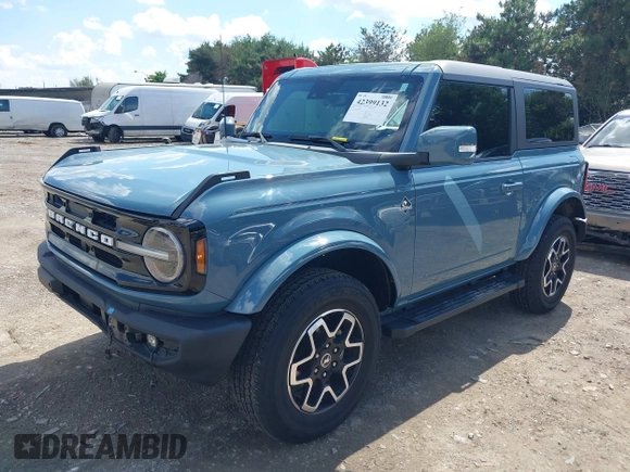 2022 Ford Bronco with VIN 1FMDE5AH3NLA89231, listed as a IAAI auction lot 42399132 with 13,244 mi miles and . Bid and sale history available at DreamBid. Image 2.