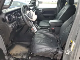 2023 Jeep Wrangler Sport Altitude with VIN 1C4HJXDG1PW679641, listed as a Copart auction lot 50371475 with 18,546 mi miles and Salvage Title. Bid and sale history available at DreamBid. Image 7.