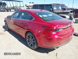 2017 Mazda 6 Grand Touring with VIN JM1GL1W52H1139776, listed as a IAAI auction lot 41671005 with 40,884 mi miles and . Bid and sale history available at DreamBid. Image 3.