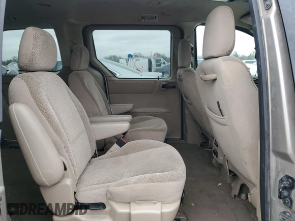 2003 Ford Windstar SE z VIN 2FMZA52473BA14056, wystawiony jako Copart lot #80307544 z przebiegiem 165 073 mil mil oraz Szkoda całkowita • Salvage title. Historia ofert i sprzedaży dostępna na DreamBid. Obrazek 11.