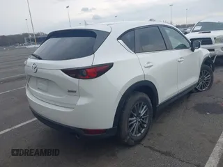 2017 Mazda CX-5 Touring with VIN JM3KFACL5H0189296, listed as a IAAI auction lot 42042328 with 60,208 mi miles and . Bid and sale history available at carsss.com. Image 4.