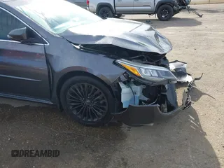2016 Toyota Avalon Limited with VIN 4T1BK1EB5GU205833, listed as a IAAI auction lot 41352698 with 152,809 mi miles. Bid and sale history available at carsss.com. Image 18.