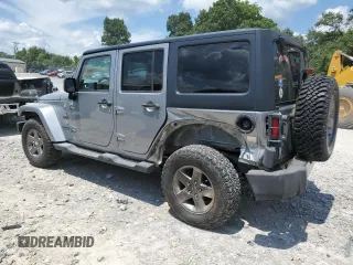 2013 Jeep Wrangler Unlimited Sport with VIN 1C4BJWDG4DL628518, listed as a Copart auction lot 65029795 with 142,852 mi miles and Salvage title. Bid and sale history available at DreamBid. Image 2.