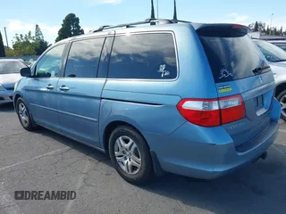 2006 Honda Odyssey EX-L z VIN 5FNRL38706B075356, wystawiony jako IAAI lot #42021960 z przebiegiem 120 455 mil mil oraz . Historia ofert i sprzedaży dostępna na DreamBid. Obrazek 3.