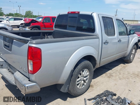 2019 Nissan Frontier SV with VIN 1N6AD0EV7KN701859, listed as a IAAI auction lot 42047454 with 182,922 mi miles and . Bid and sale history available at DreamBid. Image 4.