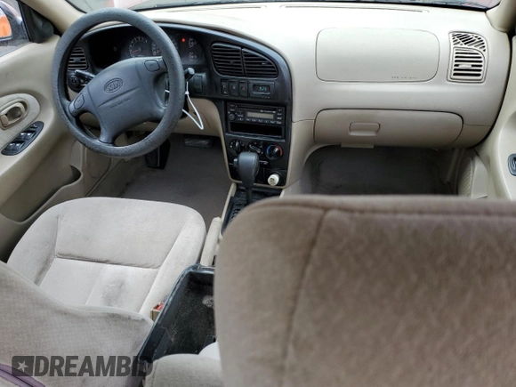 2003 Kia Spectra z VIN KNAFB121835211810, wystawiony jako Copart lot #51289625 z przebiegiem 133 868 mil mil oraz Szkoda całkowita • Salvage title. Historia ofert i sprzedaży dostępna na DreamBid. Obrazek 8.
