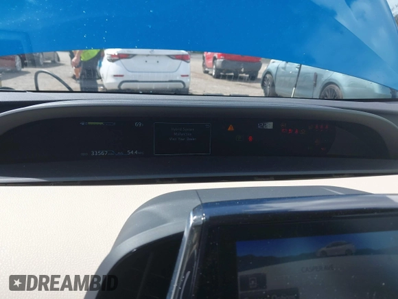2022 Toyota Prius L Eco with VIN JTDKAMFU5N3165006, listed as a IAAI auction lot 41753470 with 33,567 mi miles and . Bid and sale history available at DreamBid. Image 7.