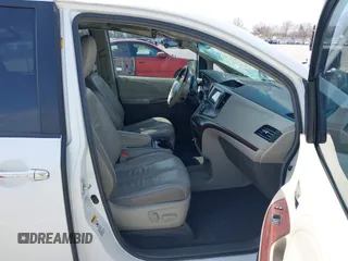 2011 Toyota Sienna XLE AAS with VIN 5TDYK3DC8BS085477, listed as a IAAI auction lot 41934541 with 131,768 mi miles and . Bid and sale history available at DreamBid. Image 5.