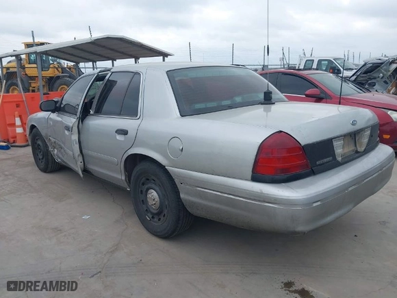 2005 Ford Police Interceptor with VIN 2FAFP71W65X163932, listed as a IAAI auction lot 41531164 with 268,769 mi miles. Bid and sale history available at carsss.com. Image 3.