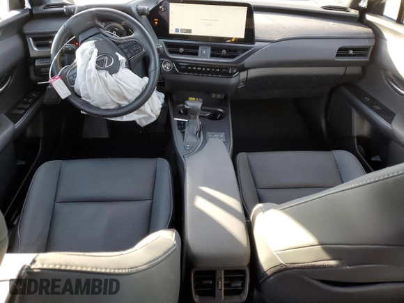 2023 Lexus UX 250h Premium с VIN JTHP9JBH8P2069805, выставлен на аукционе Copart как лот 87671095 с пробегом 12 599 миль миль и Списание • Salvage title. История ставок и продаж доступна на DreamBid. Изображение 8.