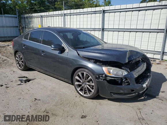 2015 Volvo S60 T5 Drive-E Premier с VIN YV140MFK2F1350695, выставлен на аукционе Copart как лот 53275725 с пробегом 98 962 миль миль и Списание • Salvage title. История ставок и продаж доступна на DreamBid. Изображение 4.