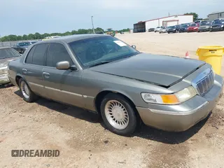2002 Mercury Grand Marquis LS Premium z VIN 2MEFM75W22X617584, wystawiony jako IAAI lot #42444579 z przebiegiem 199 914 mil mil oraz . Historia ofert i sprzedaży dostępna na DreamBid. Obrazek 1.