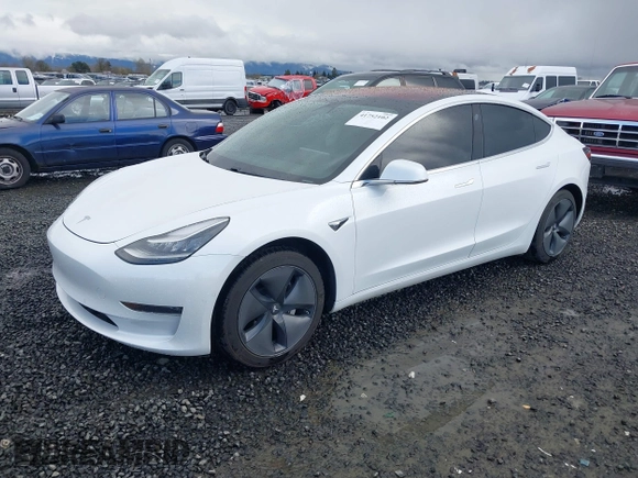 2018 Tesla Model 3 Long Range Battery with VIN 5YJ3E1EA3JF013253, listed as a IAAI auction lot 41752102 with 84,459 mi miles. Bid and sale history available at carsss.com. Image 21.