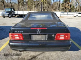 1999 Mercedes-Benz SL-Class with VIN WDBFA68F0XF175888, listed as a Copart auction lot 85984514 with 97,975 mi miles and Salvage Title. Bid and sale history available at carsss.com. Image 6.