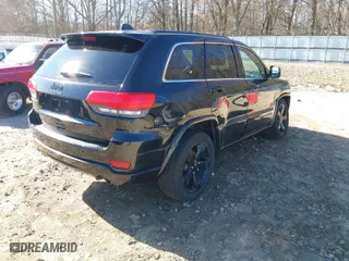 2015 Jeep Grand Cherokee Altitude with VIN 1C4RJFAG1FC628336, listed as a IAAI auction lot 41654598 with 187,359 mi miles. Bid and sale history available at carsss.com. Image 4.