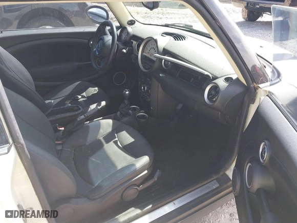 2013 MINI Cooper Clubman with VIN WMWZF3C57DT571338, listed as a IAAI auction lot 41367674 with 77,628 mi miles. Bid and sale history available at carsss.com. Image 5.