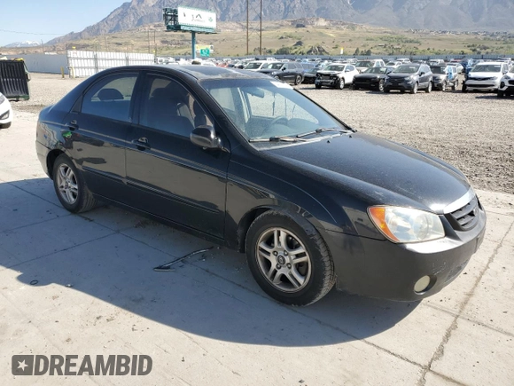 2005 Kia Spectra LX with VIN KNAFE122555102997, listed as a Copart auction lot 54191025 with 142,071 mi miles and Salvage Title. Bid and sale history available at carsss.com. Image 4.